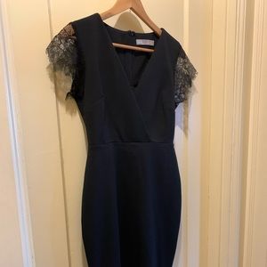 Black midi dress with eyelash lace trim. Worn once